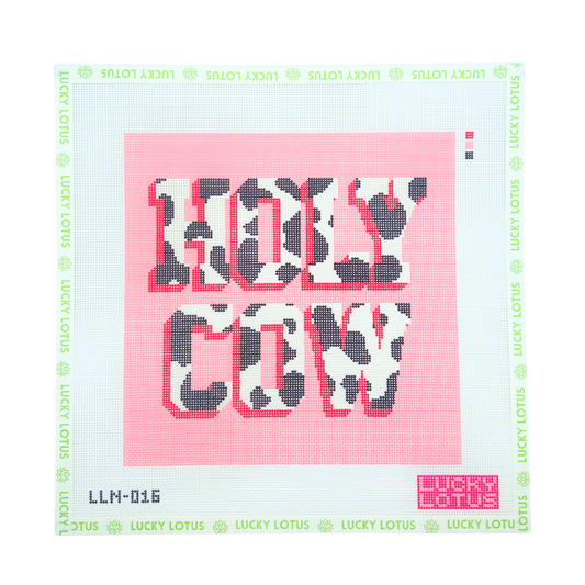 Holy Cow needlepoint canvas featuring bold cow print lettering with bright pink outlines on a pink background.