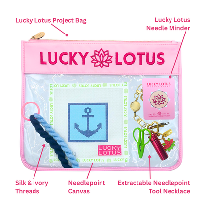 Contents of the Anchor Beginner Needlepoint Kit including hand-painted canvas, Silk & Ivory threads, project bag, needle minder, and extractable needlepoint tool keychain.