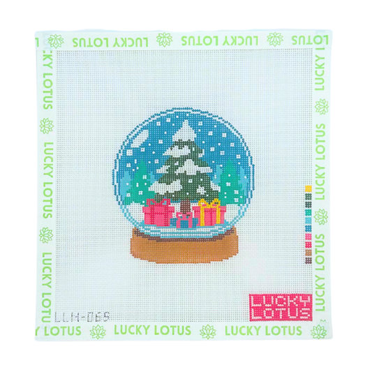Christmas snow globe needlepoint canvas with snowy tree and colorful presents by Lucky Lotus Needlepoint