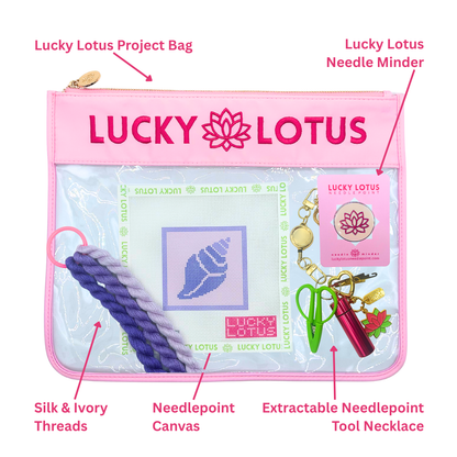 Contents of the Conch Shell Beginner Needlepoint Kit including hand-painted canvas, Silk & Ivory threads, project bag, needle minder, and extractable needlepoint tool keychain.