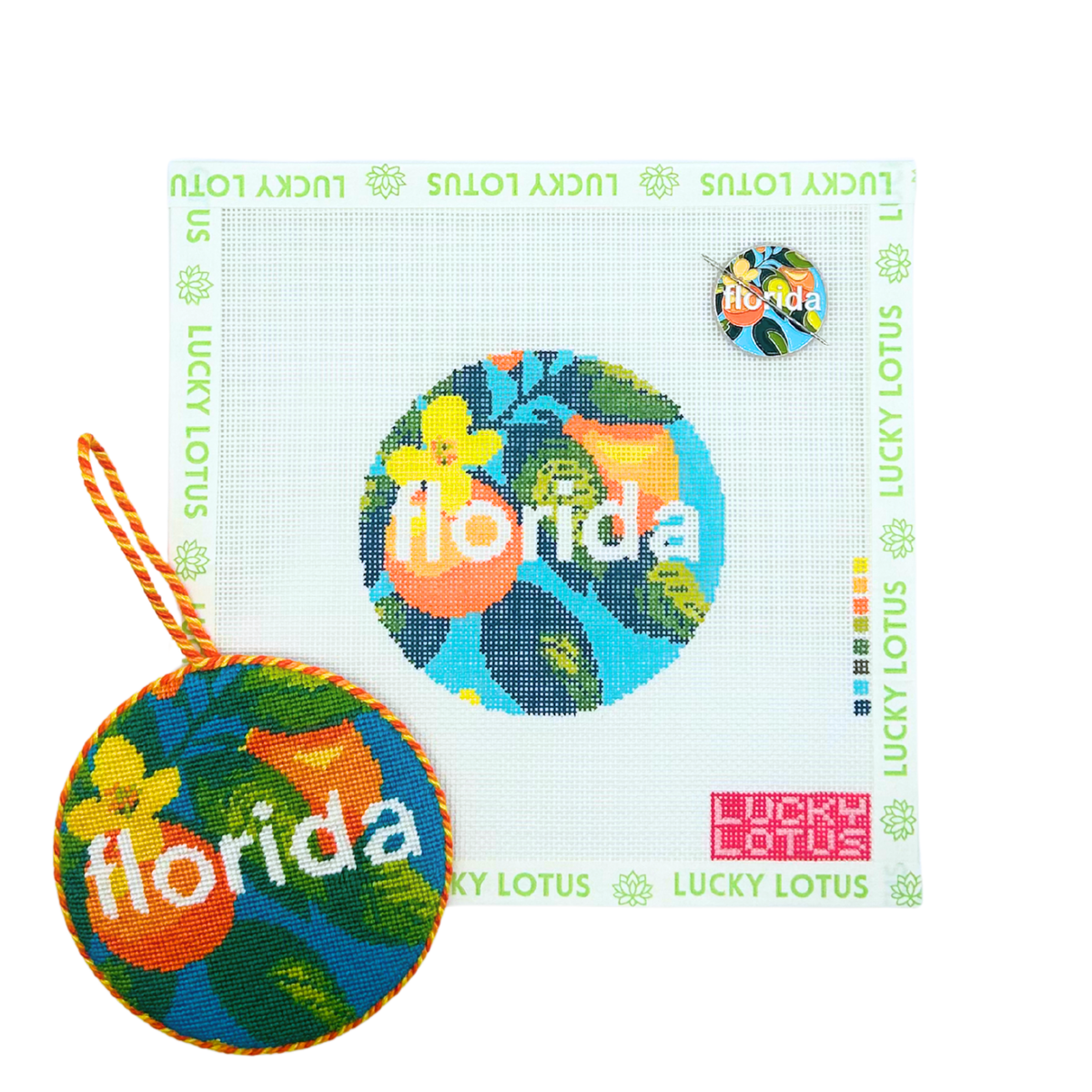 Florida needlepoint canvas with matching Florida needle minder and finished round needlepoint ornament featuring colorful citrus and tropical leaves