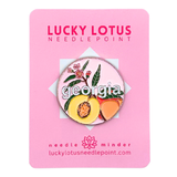 Georgia needle minder with colorful peaches, peach blossoms, green leaves, and Georgia lettering by Lucky Lotus Needlepoint.
