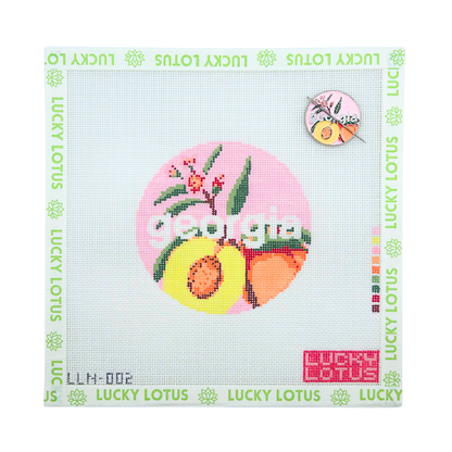Georgia state needlepoint canvas featuring peaches and flowers with the matching Georgia needle minder.