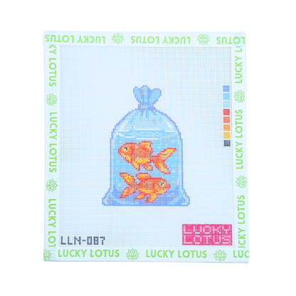 18 mesh Goldfish in a Bag needlepoint canvas featuring two orange goldfish inside a clear water bag, designed by Lucky Lotus Needlepoint.