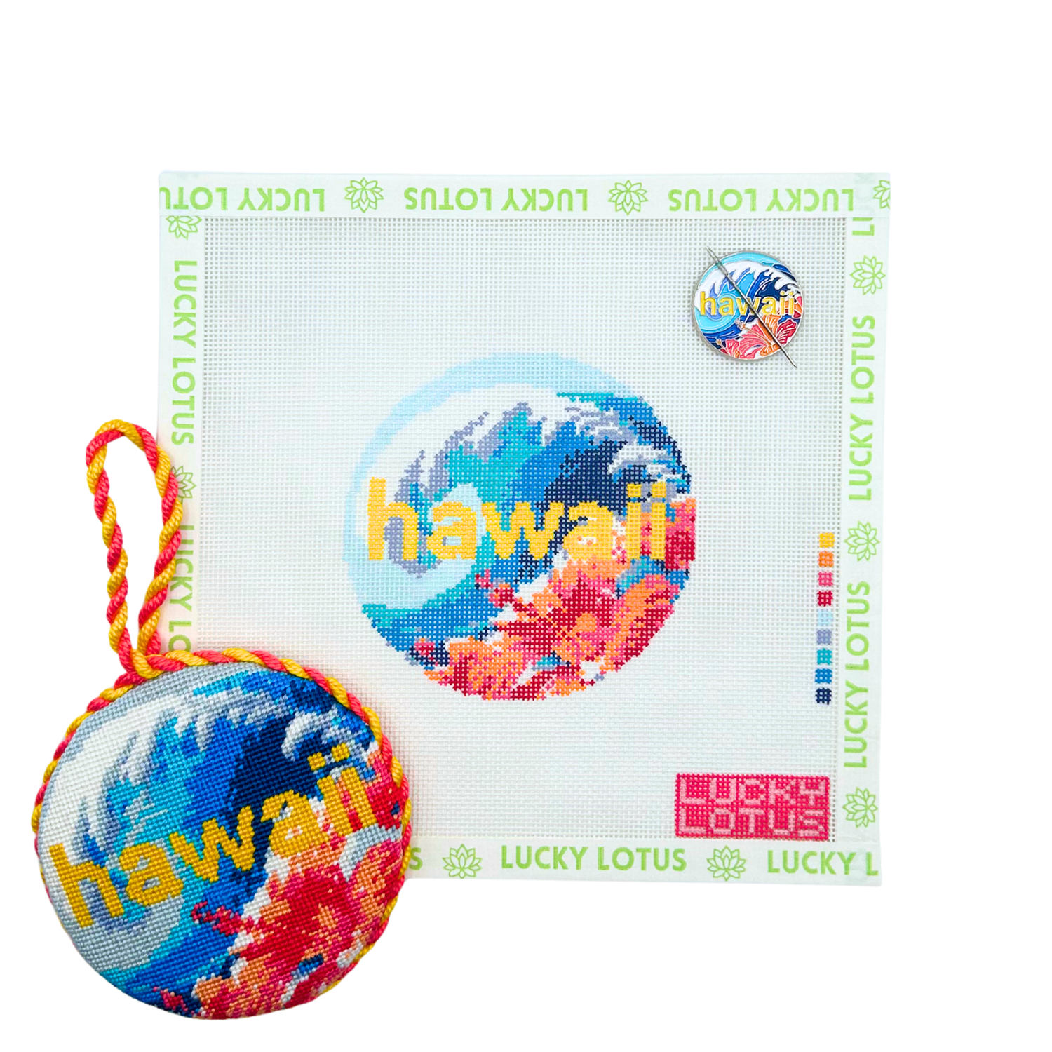 Hawaii needlepoint canvas with matching Hawaii needle minder and finished round ornament featuring colorful ocean waves and hibiscus flowers.