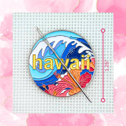 Hawaii needlepoint needle minder featuring ocean waves and colorful hibiscus flowers, measuring approximately 1.25 inches.