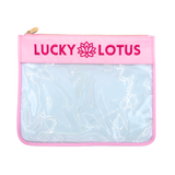 Pink pouch with 'Lucky Lotus' branding on a white background for needlepoint project bag