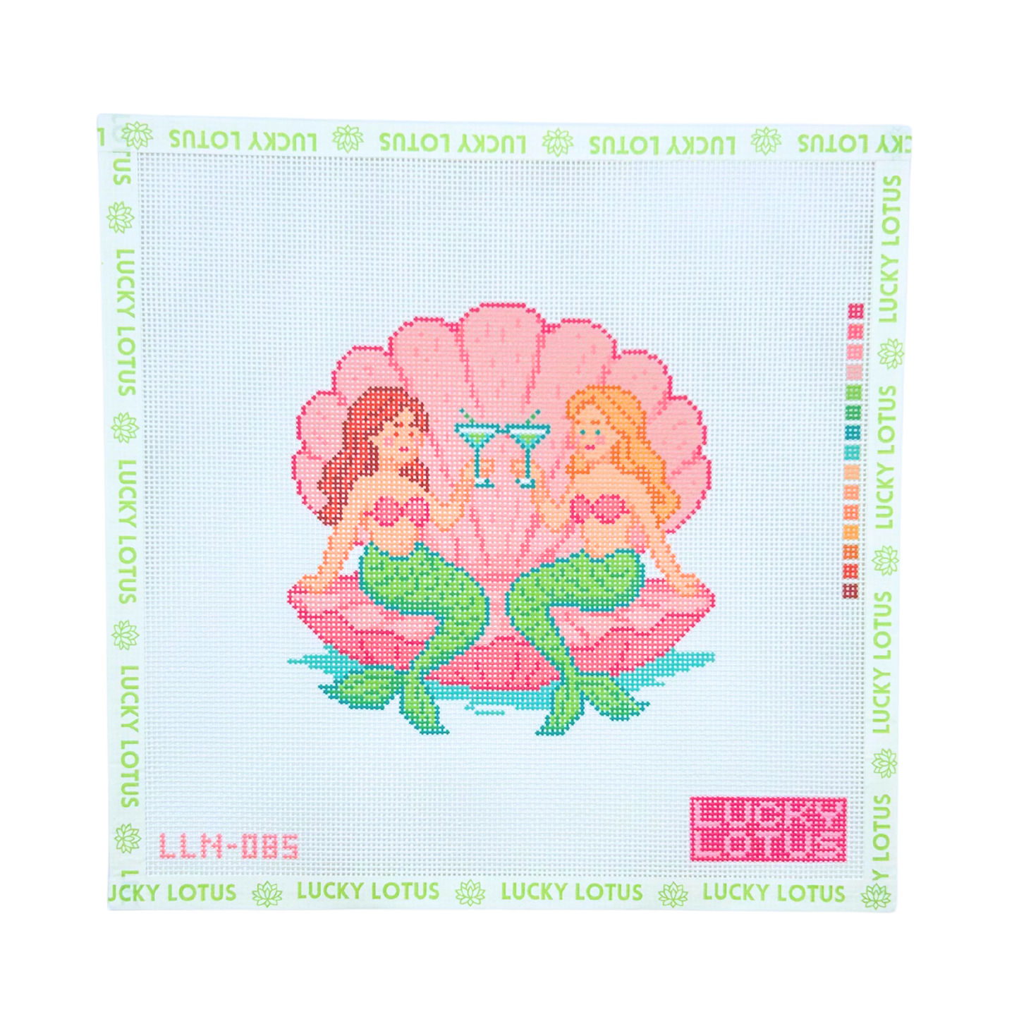 13 mesh mermaids needlepoint canvas featuring two mermaids sitting inside a pink seashell, designed for coastal and summer needlepoint projects.