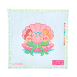 13 mesh mermaids needlepoint canvas featuring two mermaids sitting inside a pink seashell, designed for coastal and summer needlepoint projects.