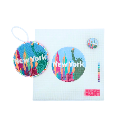 New York City needlepoint canvas with finished ornament and matching New York needle minder by Lucky Lotus Needlepoint