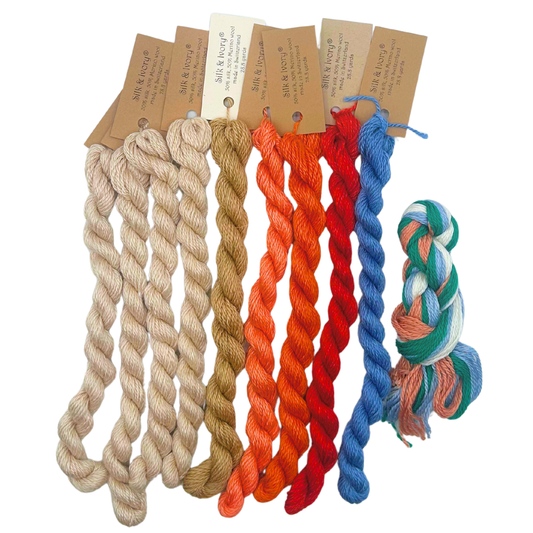 Coordinating cream, tan, coral, orange, red, blue and multicolor threads for the Seashells and Crabs canvas