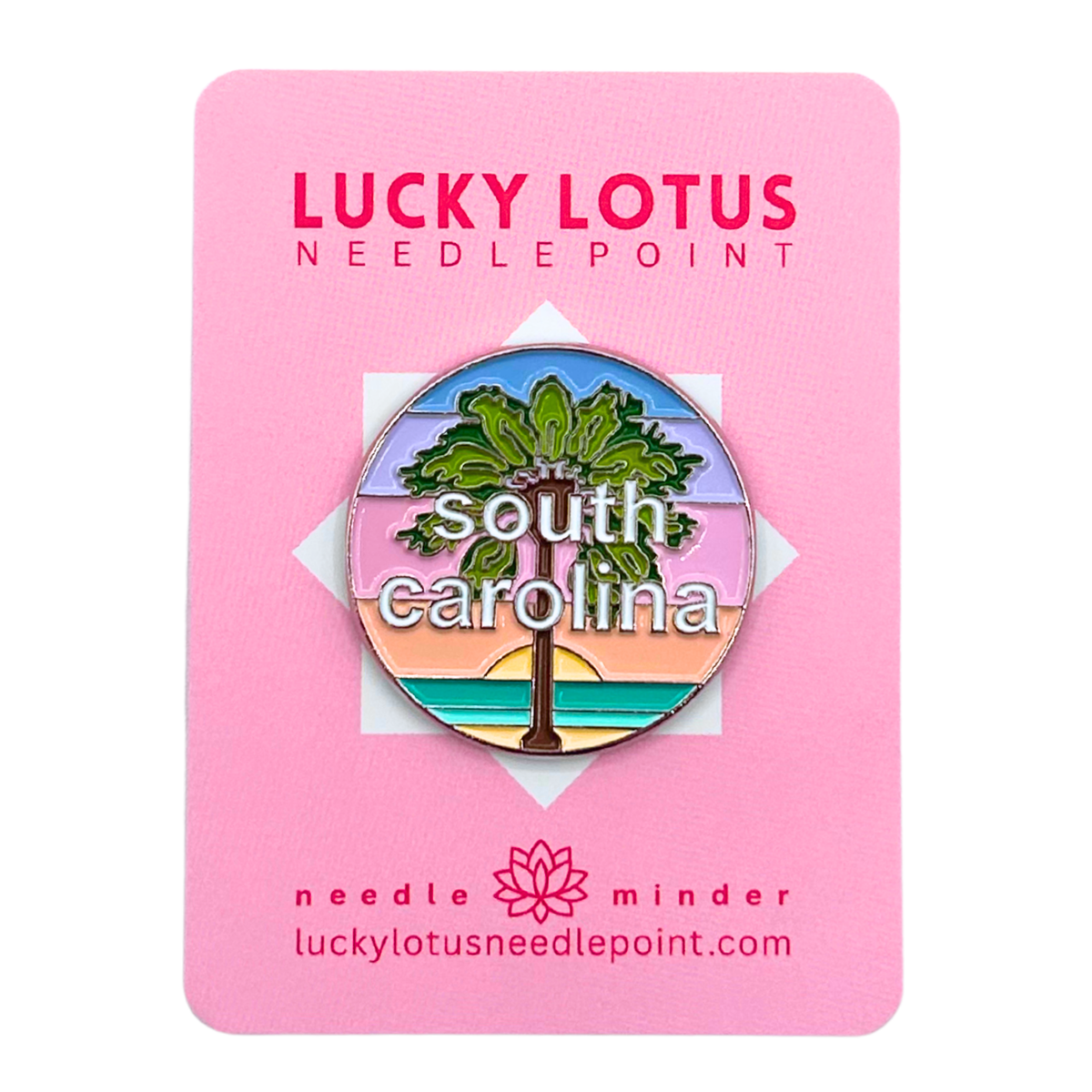South Carolina needle minder featuring a palmetto tree against a colorful coastal sunset with South Carolina lettering.