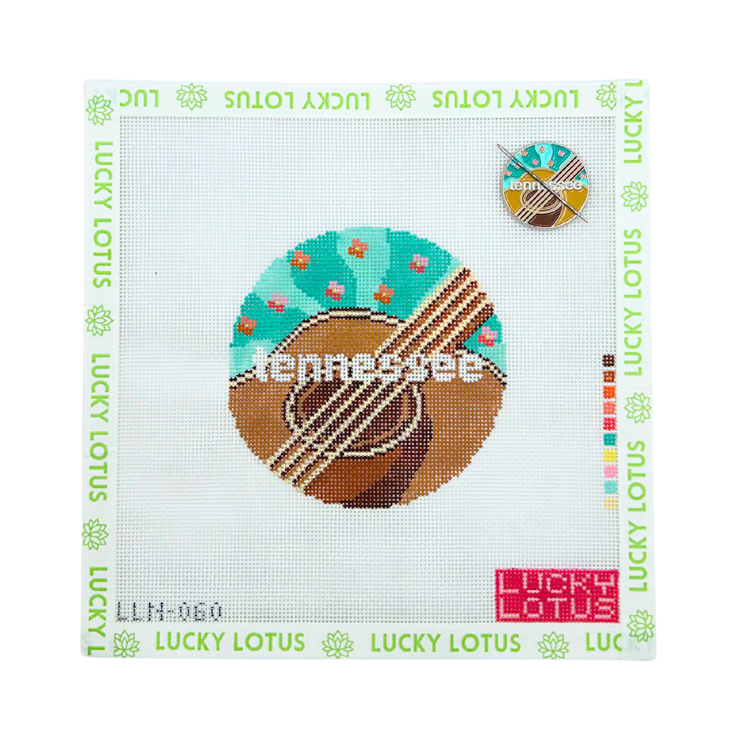 Tennessee state needlepoint canvas featuring an acoustic guitar and colorful floral details with the matching Tennessee needle minder.