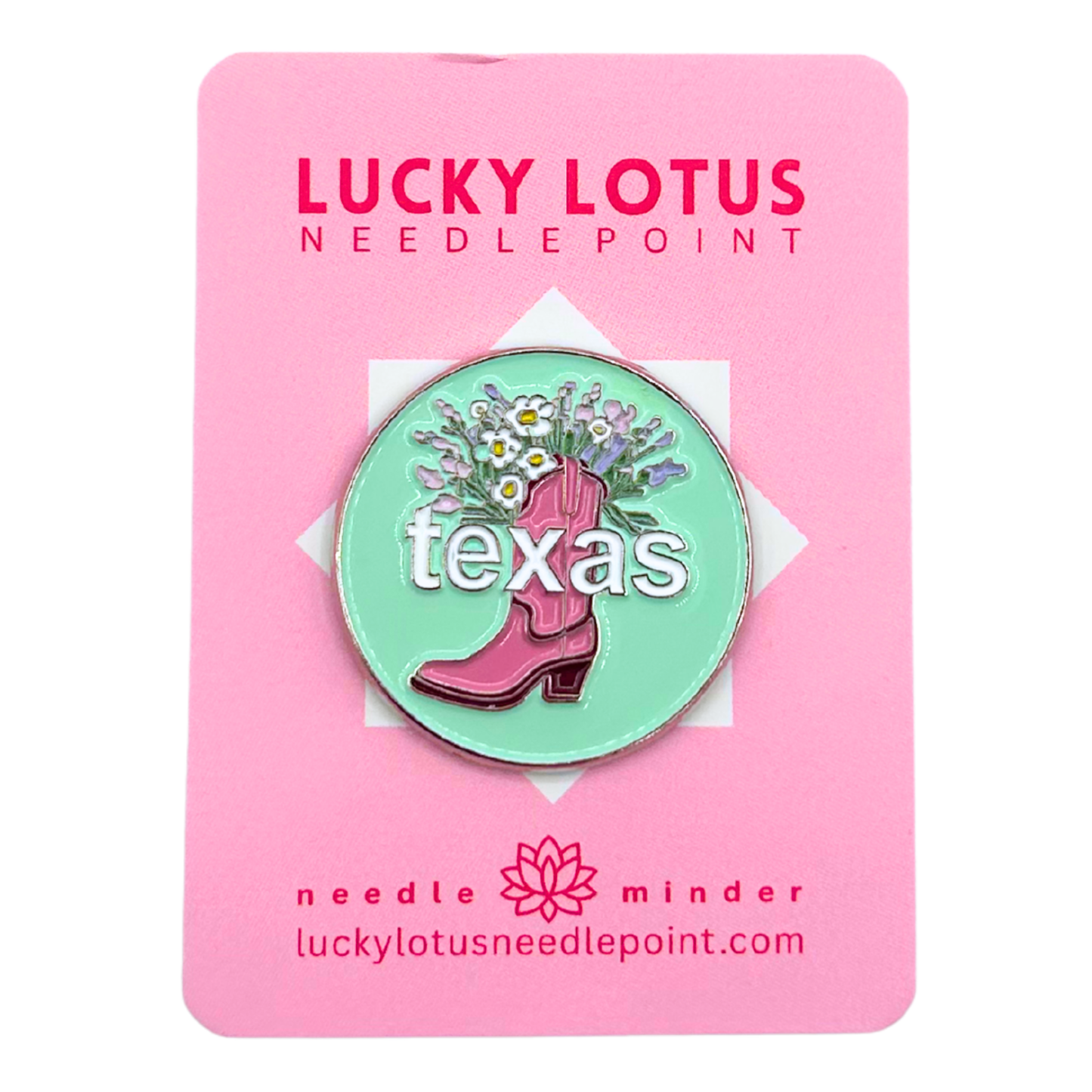 Texas needle minder featuring a pink cowboy boot filled with colorful wildflowers on a mint green background with Texas lettering.
