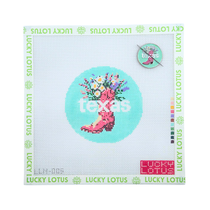 Texas state needlepoint canvas featuring a pink cowboy boot filled with colorful wildflowers with the matching Texas needle minder.